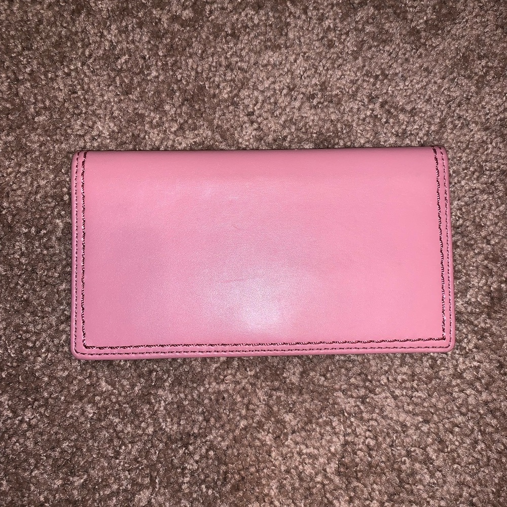 Pink leather coach checkbook cover